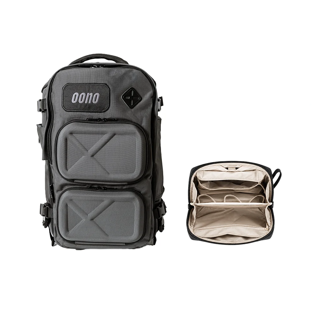 Oono Backpack V2 20L in Charcoal Gray with the Toiletry Bag open, showing its elastic-pocket interior