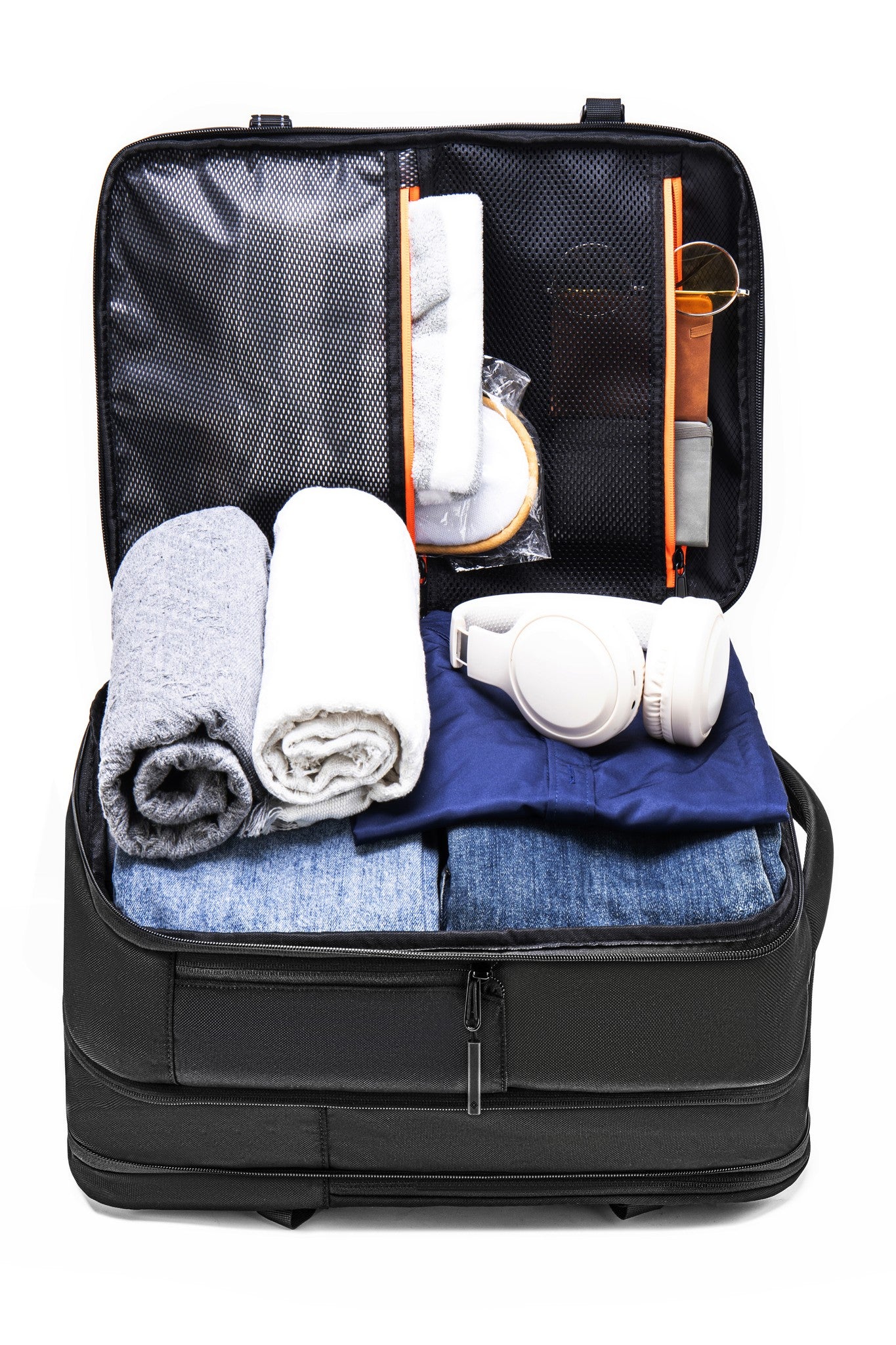 Main compartment fully open showing packed capacity at 35L expanded