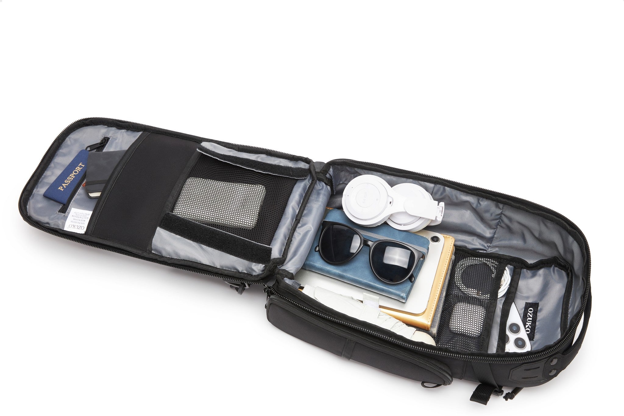 Ridge Sling Backpack 12L in Black - top-down view of the packed main compartment from a different angle