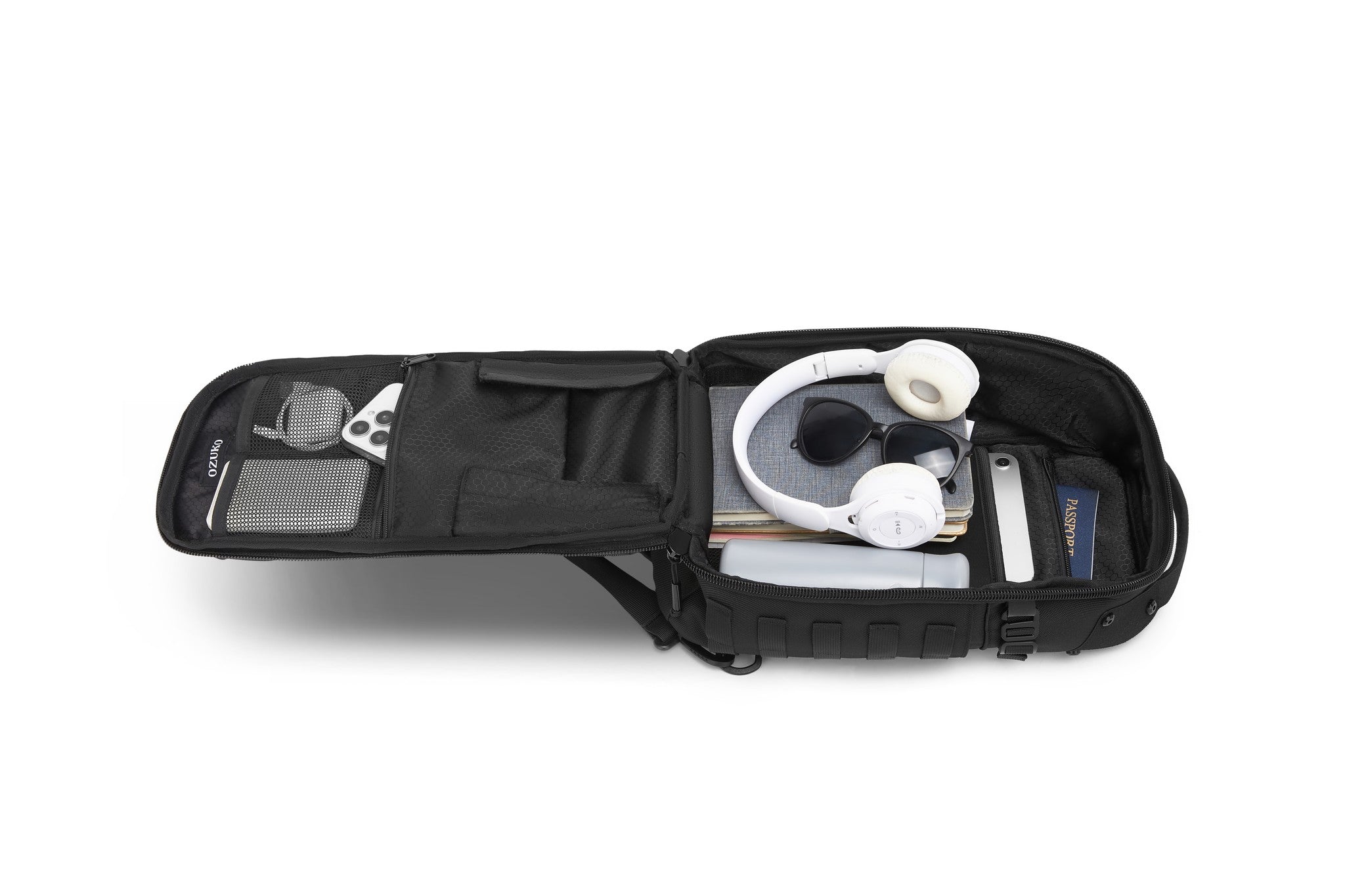 Daytrip Backpack 12L in Black - wide top-down view of the fully packed main compartment