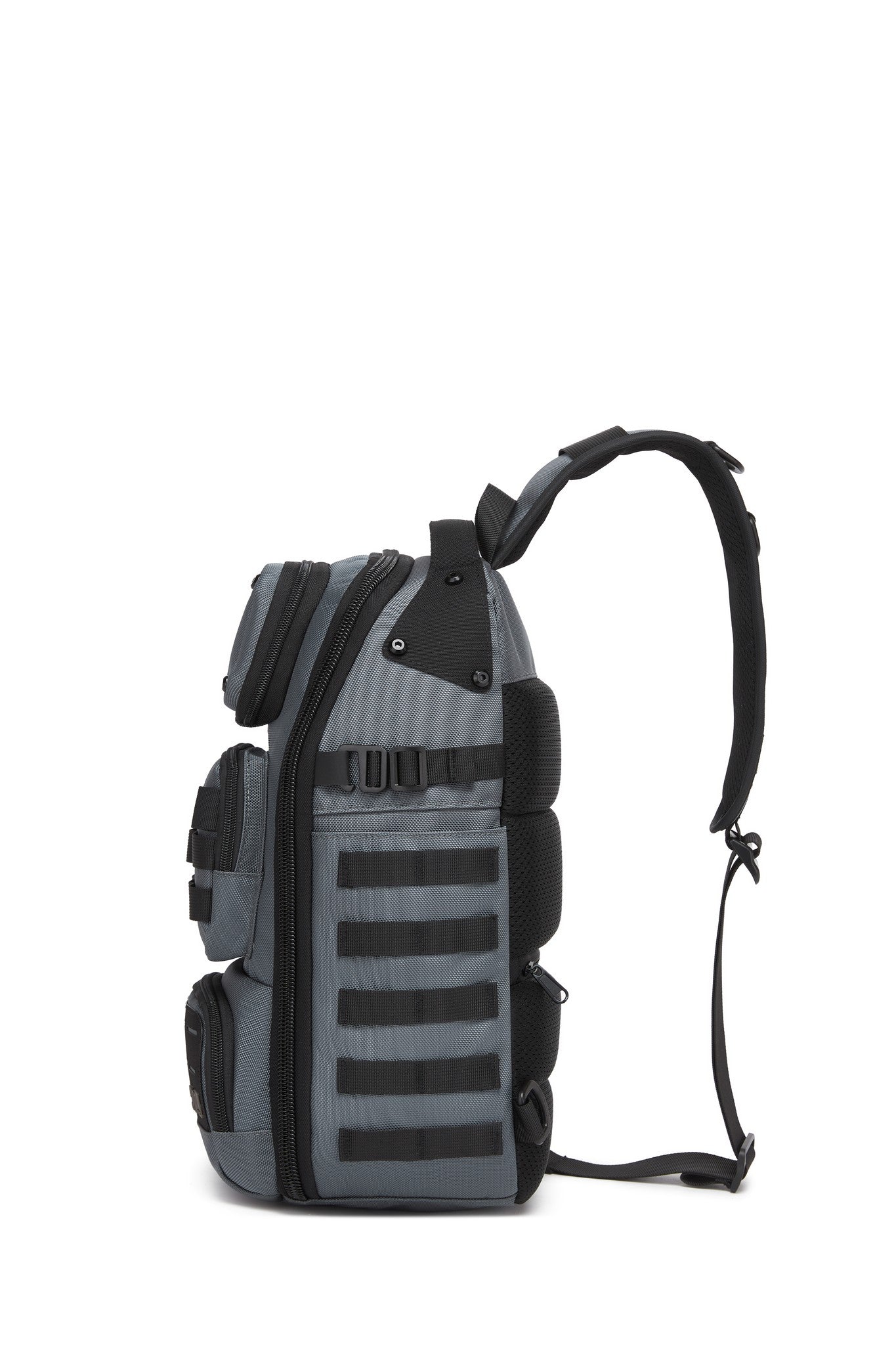 Daytrip Backpack 12L in Gray - side view showing the MOLLE webbing and adjustable sling strap