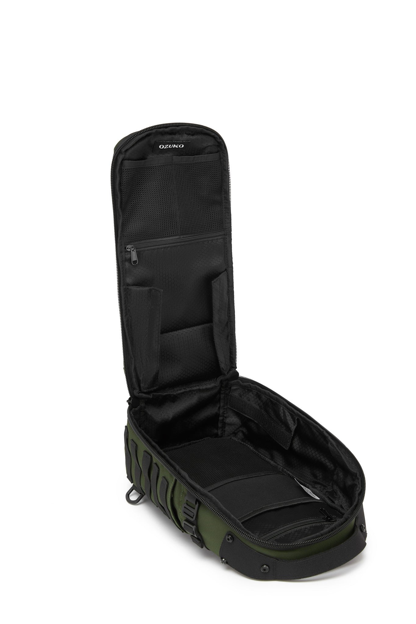 Daytrip Backpack 12L in Green - open side view showing the empty interior lid pockets and main compartment