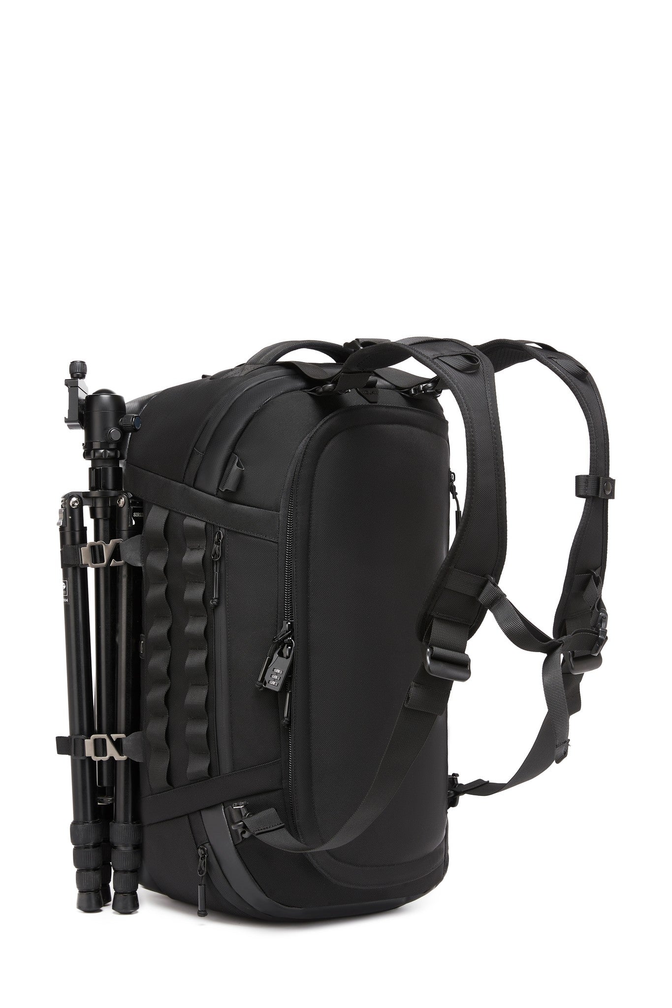 Worn as a backpack with a camera tripod strapped to the front MOLLE webbing