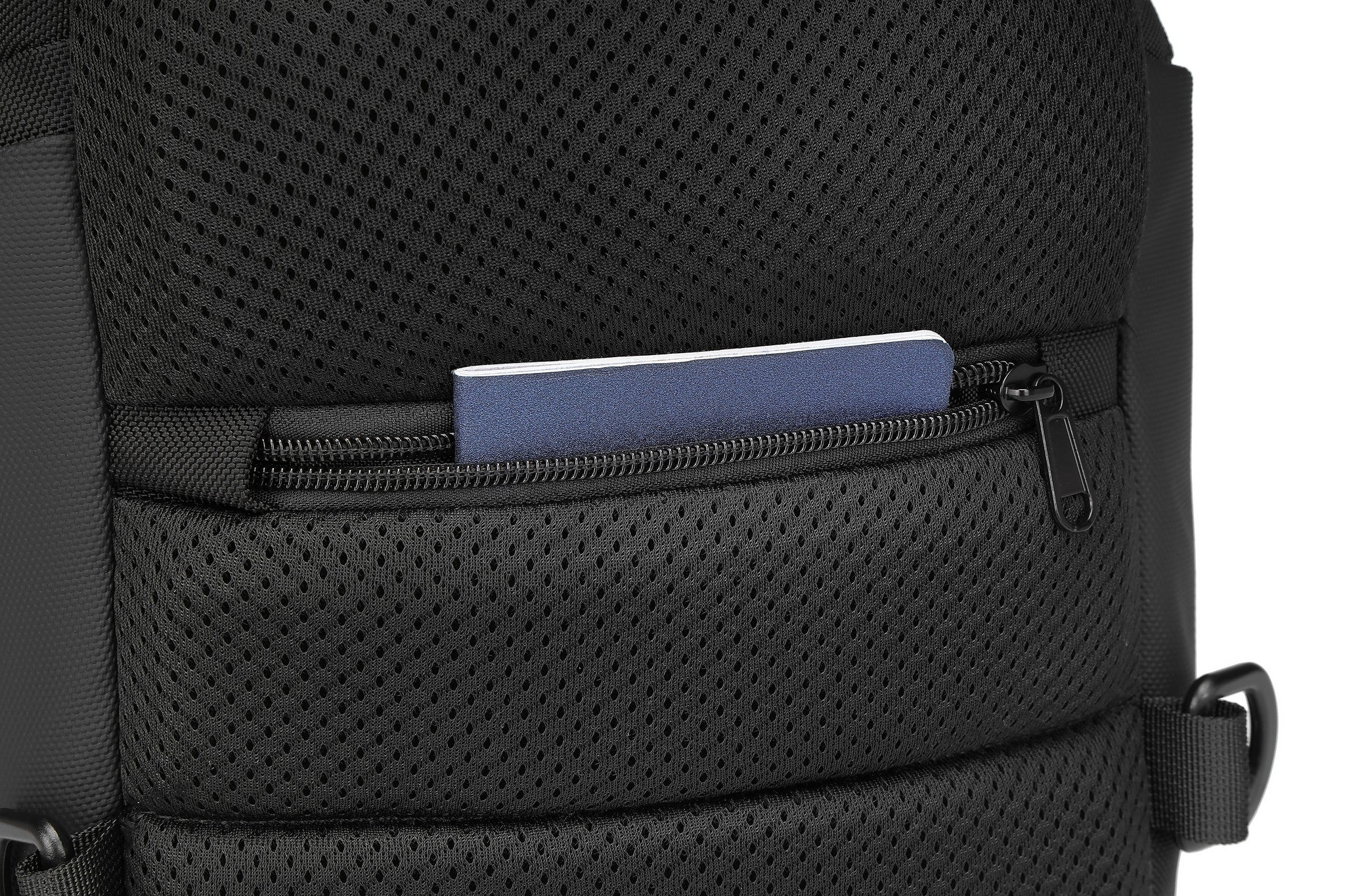 Ridge Sling 8L in Black, close-up of a mesh zippered pocket holding a slim card