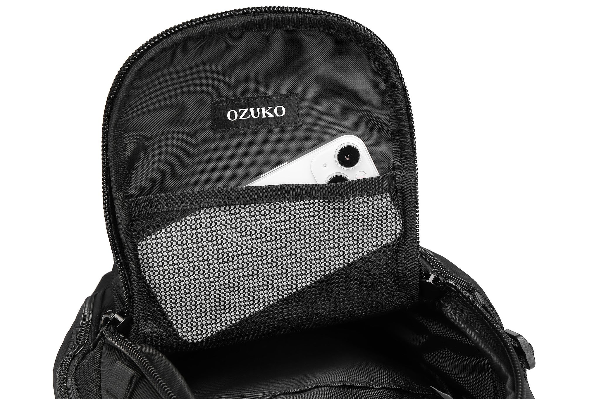 Ridge Sling 8L in Black, close-up of the top pocket with a branded mesh ID panel holding a phone
