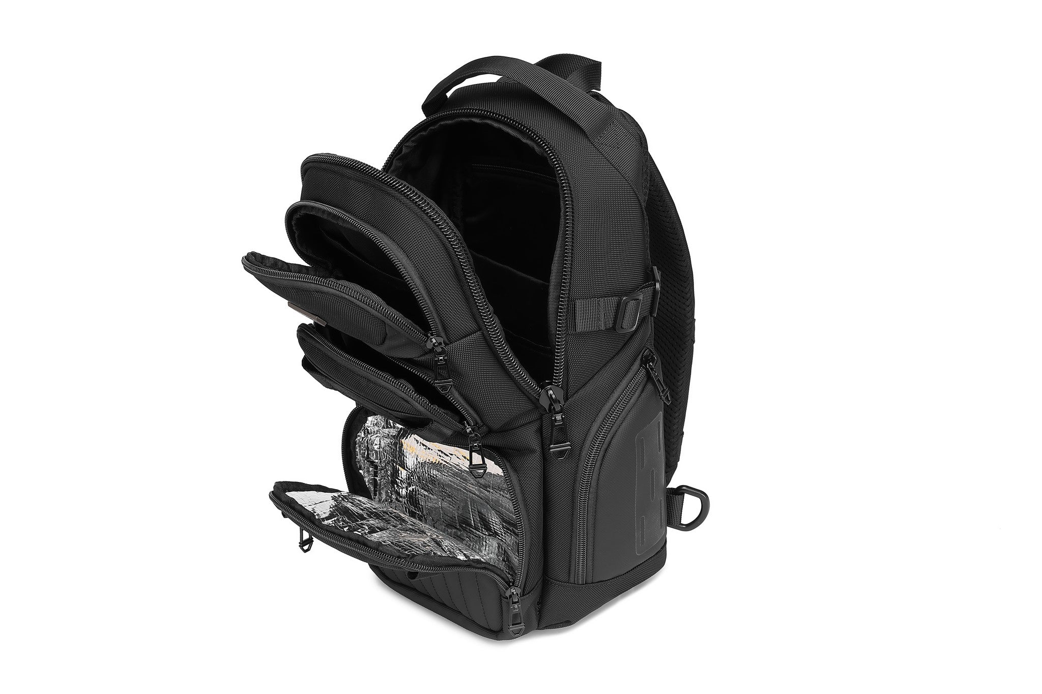 Ridge Sling 8L in Black, top-down view with all compartments open and empty